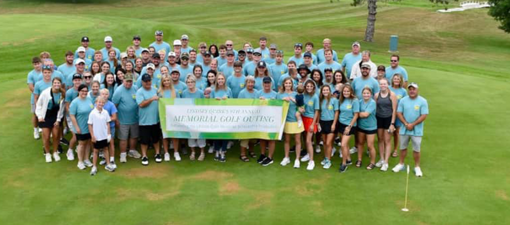 Golfers on golf course during event